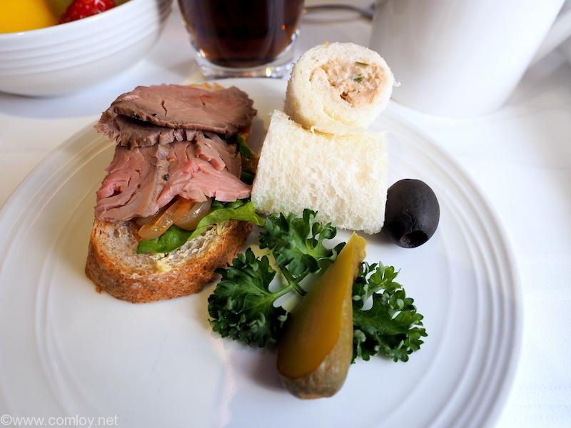 Roasted beef and spicy onion on wholemeal baguette